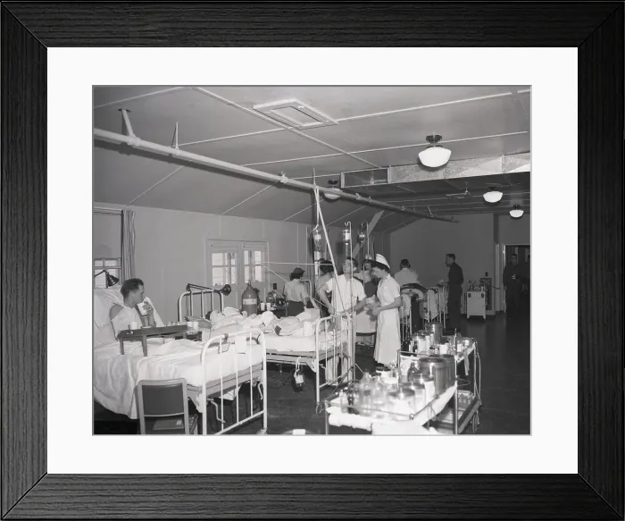 Framed Print : Doctors and Nurses Working with Patients Framed Print : Doctors and Nurses Working with Patients