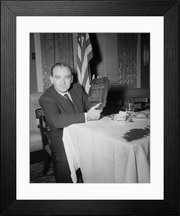 Framed Print : Mccarthy Holding Plaque For Fighting Com
