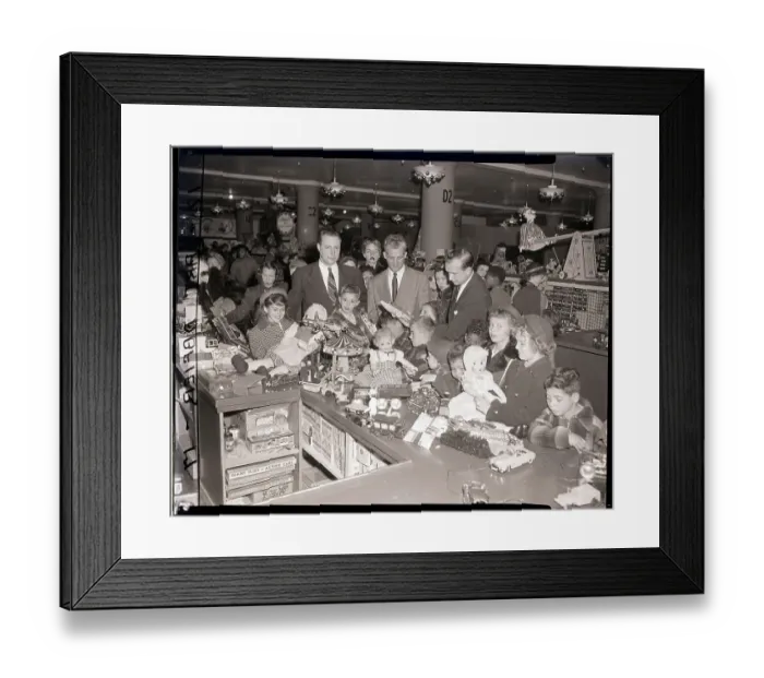 Framed Print : Orphans at Gimbels Touch Doll at Counter