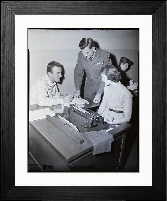 Framed Print : Man Seated At Typist Desk, Officer Over Framed Print : Man Seated At Typist Desk, Officer Over