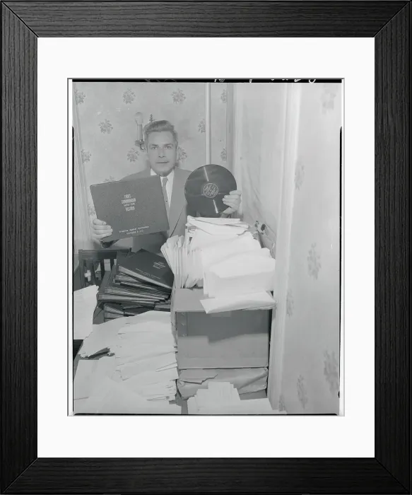 Framed Print : Man Holding a Record Album Framed Print : Man Holding a Record Album