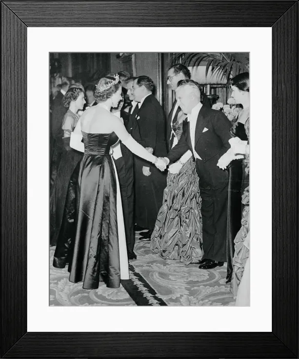 Framed Print : Queen Elizabeth Shaking Hands with Charlie Chaplin Framed Print : Queen Elizabeth Shaking Hands with Charlie Chaplin