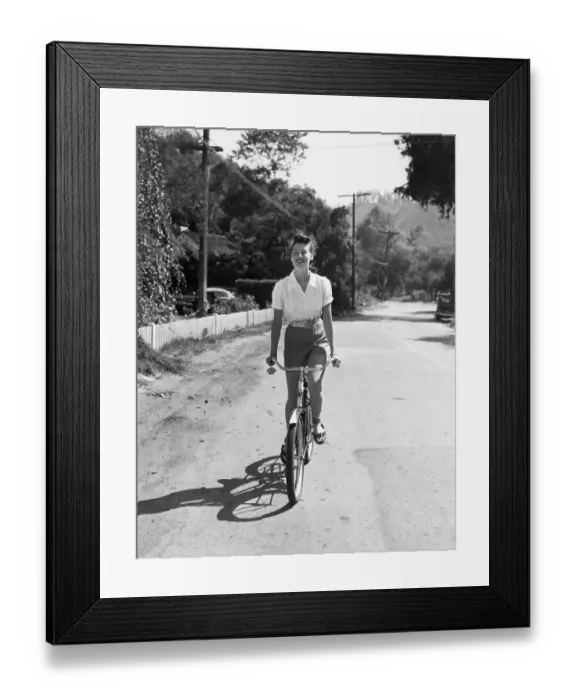 Framed Print : Ava Gardner Riding a Bicycle Framed Print : Ava Gardner Riding a Bicycle