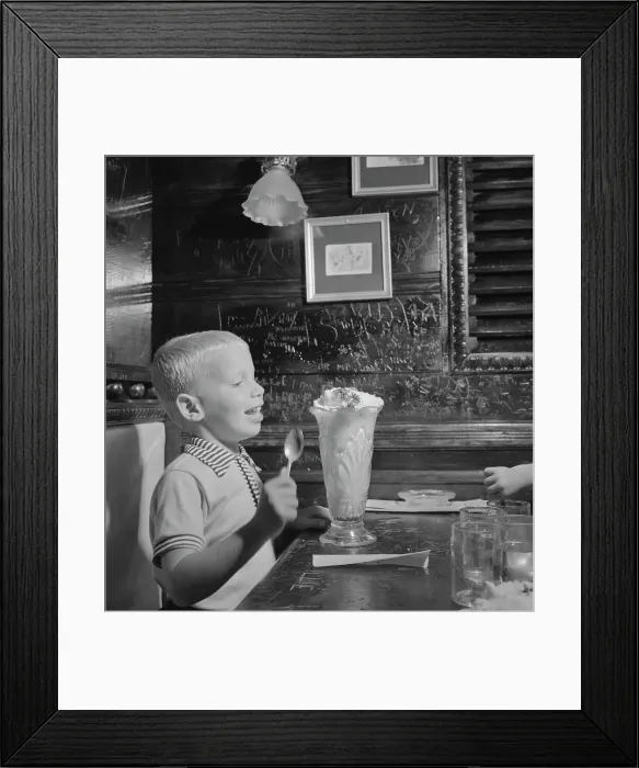 Framed Print : Boy Eating Large Ice Cream Sundae Framed Print : Boy Eating Large Ice Cream Sundae