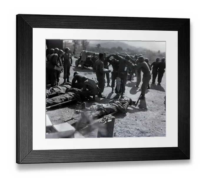 Framed Print : Corpsmen Work On Wounded