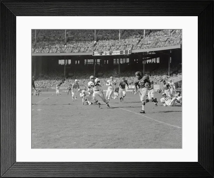 Framed Print : Charlie Connerly Carrying Football Framed Print : Charlie Connerly Carrying Football