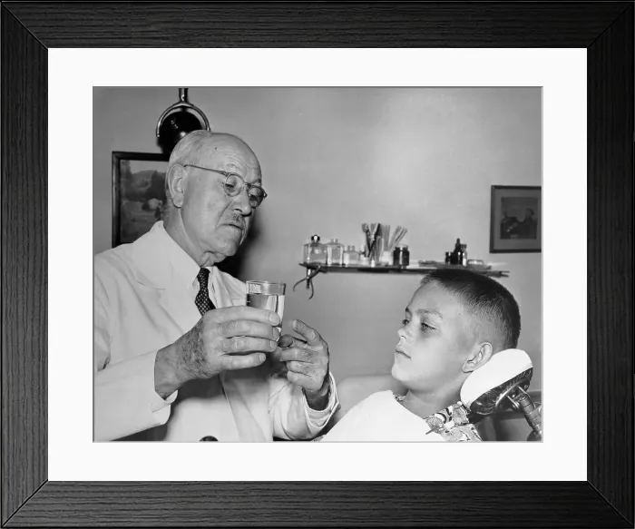 Framed Print : Dentist Instructing Patient Framed Print : Dentist Instructing Patient