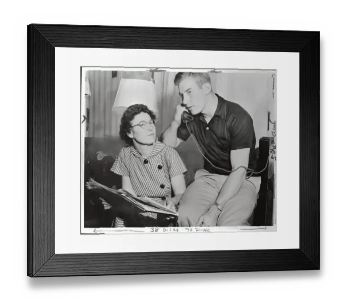 Framed Print : Mickey Mantle Talking on Telephone Near His Mother Framed Print : Mickey Mantle Talking on Telephone Near His Mother