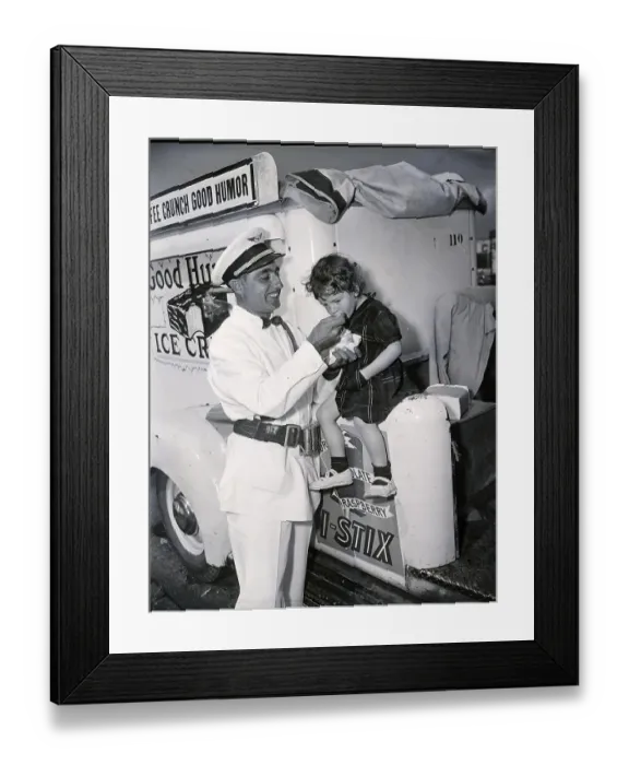 Framed Print : Ice Cream Man Feeding Little Girl Framed Print : Ice Cream Man Feeding Little Girl
