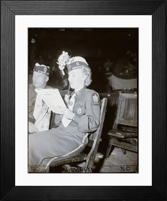 Framed Print : Woman In Uniform Seated Looking At Progr Framed Print : Woman In Uniform Seated Looking At Progr