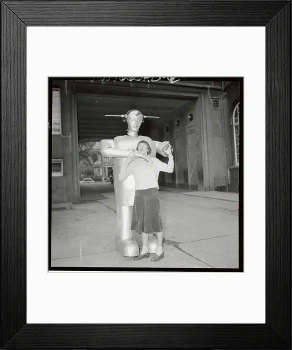 Framed Print : Woman Dancing with a Robot Framed Print : Woman Dancing with a Robot