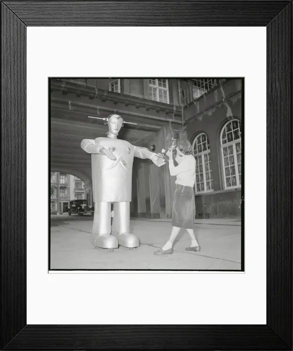 Framed Print : Woman Dancing with a Robot Framed Print : Woman Dancing with a Robot
