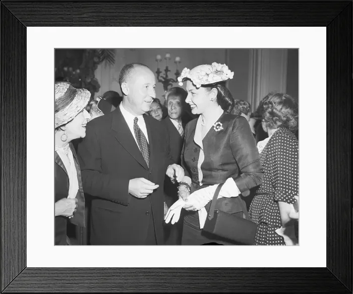Framed Print : Designer Christian Dior Attending Fashion Show Party Framed Print : Designer Christian Dior Attending Fashion Show Party