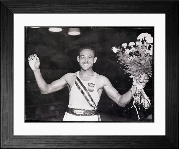 Framed Print : Olympic Boxer Holding Medal and Bouquet Framed Print : Olympic Boxer Holding Medal and Bouquet