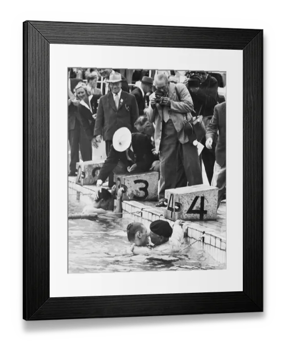 Framed Print : Father Congratulates Swimmer in Pool Framed Print : Father Congratulates Swimmer in Pool