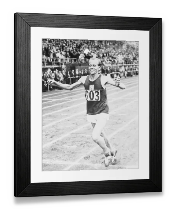 Framed Print : Emil Zapotek Crossing Finish Line Framed Print : Emil Zapotek Crossing Finish Line