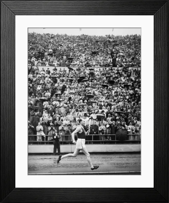 Framed Print : Paavo Nurmi Running with Olympic Torch Framed Print : Paavo Nurmi Running with Olympic Torch