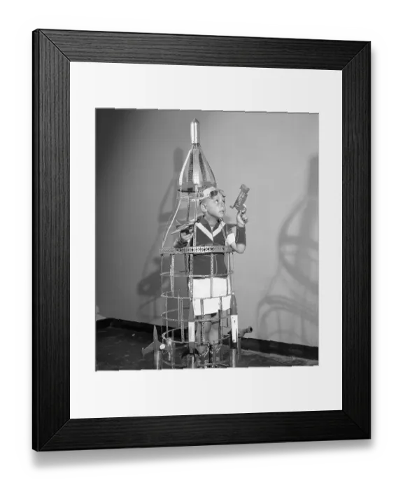 Framed Print : Johnny Schloss Playing with Toys