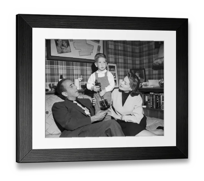 Framed Print : Humphrey Bogart, Lauren Bacall, and Son Stephen Bogart Holding Oscar Trophy Framed Print : Humphrey Bogart, Lauren Bacall, and Son Stephen Bogart Holding Oscar Trophy