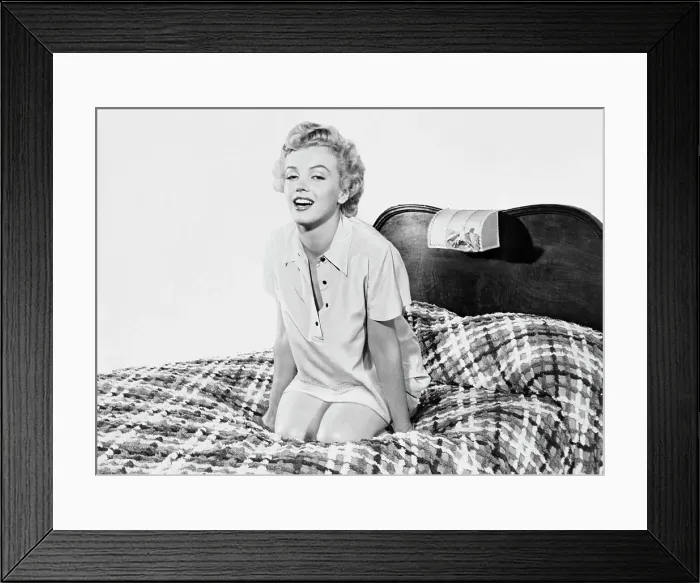 Framed Print : Marilyn Monroe on Bed in Nightshirt Framed Print : Marilyn Monroe on Bed in Nightshirt