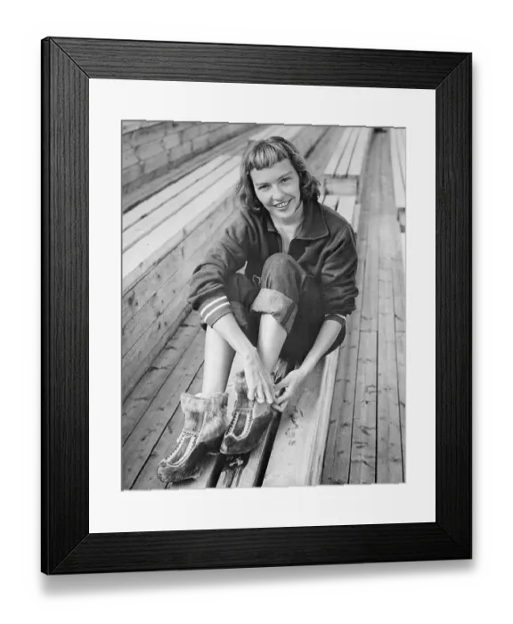Framed Print : Gail Peters Trying on Reindeer Hide Boots