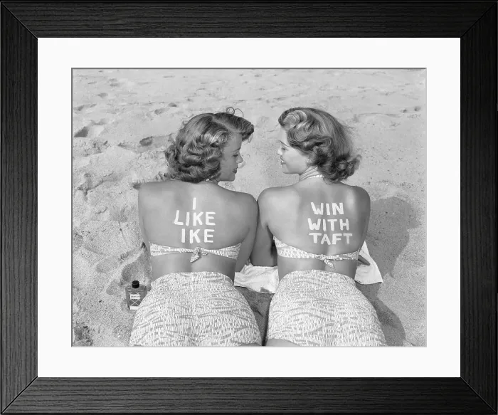 Framed Print : Twins on Beach Display Opposing Political Choices Framed Print : Twins on Beach Display Opposing Political Choices
