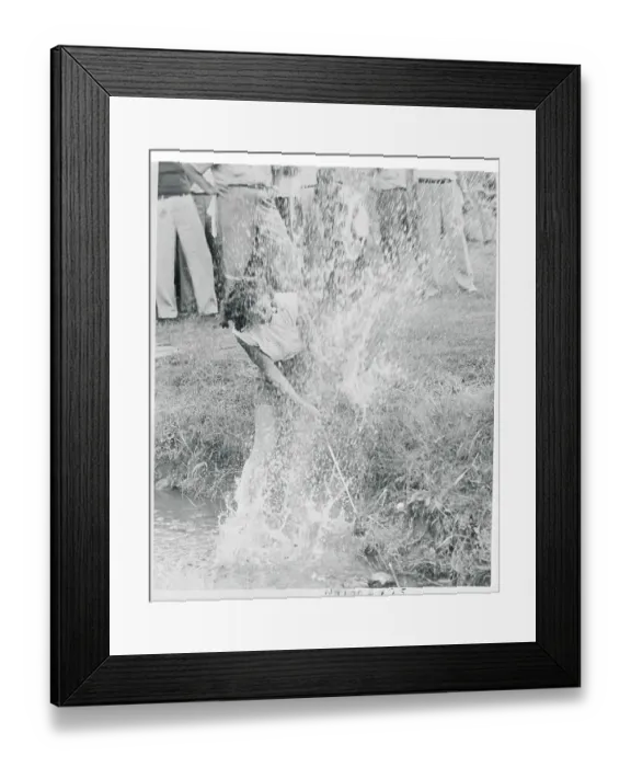 Framed Print : Golf Player Hitting Ball Out of a Creek