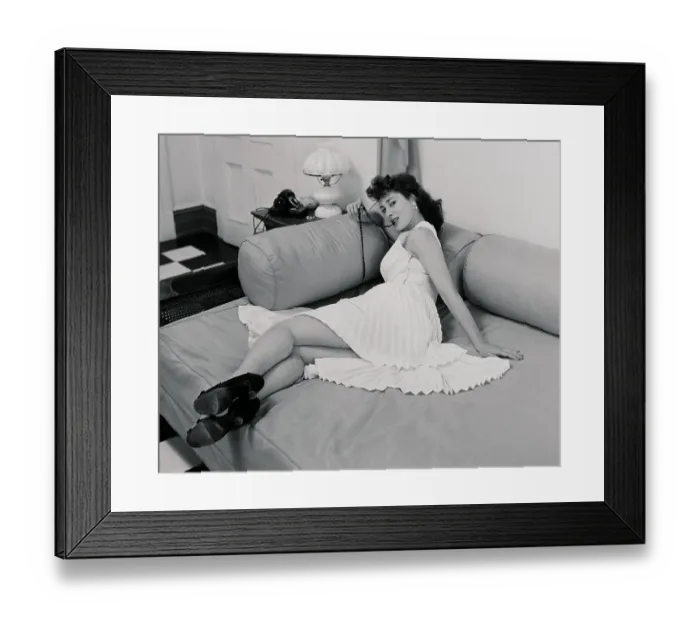 Framed Print : Rita Hayworth Lying on Couch Framed Print : Rita Hayworth Lying on Couch