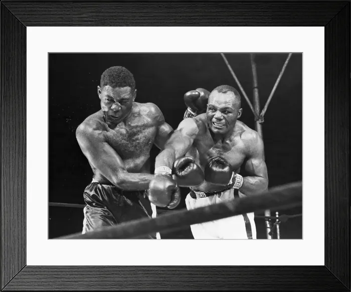 Framed Print : Joe Walcott Punches Ezzard Charles;Fight Framed Print : Joe Walcott Punches Ezzard Charles;Fight