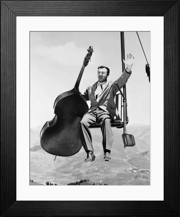 Framed Print : Man with Upright Bass Riding Ski Lift Framed Print : Man with Upright Bass Riding Ski Lift