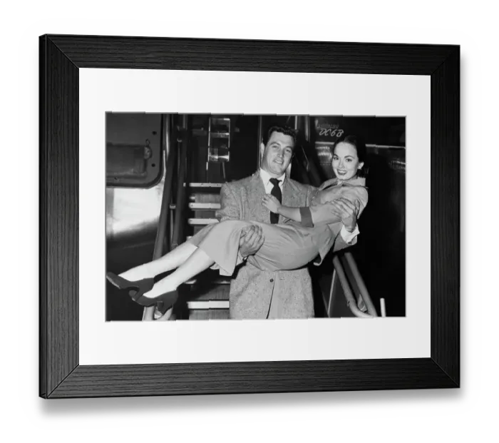 Framed Print : Rock Hudson Carrying Ann Blyth In His Arms Framed Print : Rock Hudson Carrying Ann Blyth In His Arms