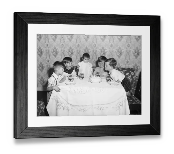 Framed Print : Child Blowing Out Birthday Candles
