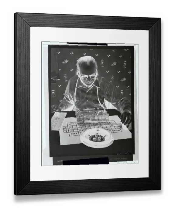 Framed Print : Man with Calculator and Roulette Wheel Framed Print : Man with Calculator and Roulette Wheel
