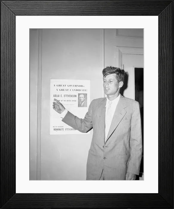 Framed Print : John F. Kennedy Pointing to a Poster Framed Print : John F. Kennedy Pointing to a Poster