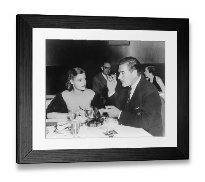 Framed Print : Errol Flynn Conversing with Thompson Andrews