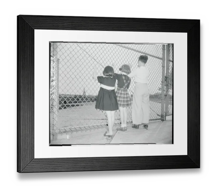 Framed Print : Child Immigrants Looking Through Fence Framed Print : Child Immigrants Looking Through Fence
