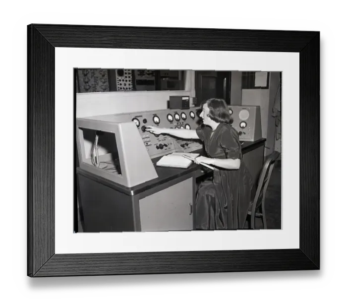 Framed Print : Woman At Controls Of Cyclotron Framed Print : Woman At Controls Of Cyclotron