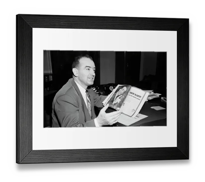 Framed Print : McCarthy Looking Over Article in Magazine Framed Print : McCarthy Looking Over Article in Magazine