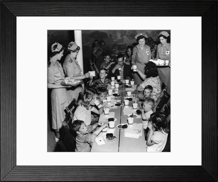 Framed Print : Family Of Ten Seated & Being Fed / Red Cro Framed Print : Family Of Ten Seated & Being Fed / Red Cro