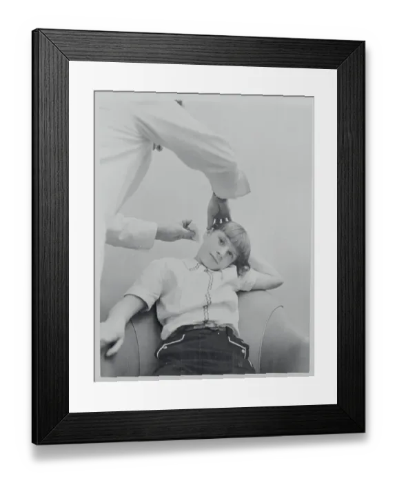 Framed Print : Physician Examining a Young Girl's Ear for Hearing Aid Framed Print : Physician Examining a Young Girl's Ear for Hearing Aid
