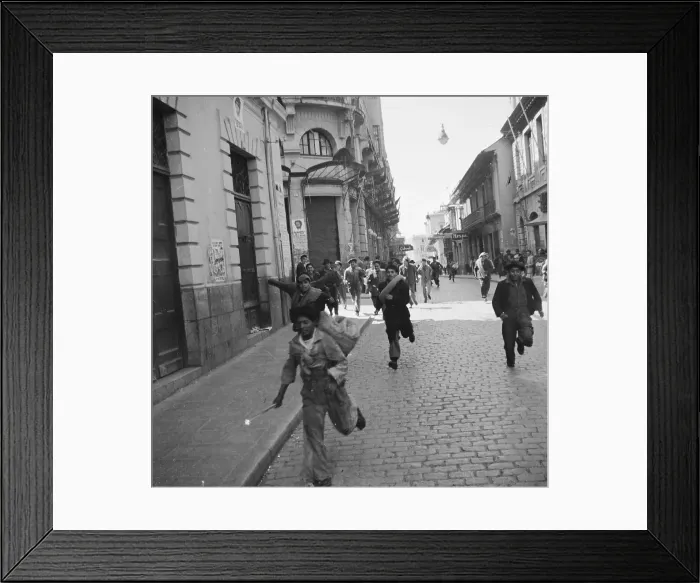 Framed Print : Bolivian Revolutionaries Running Through Streets of La Paz Framed Print : Bolivian Revolutionaries Running Through Streets of La Paz