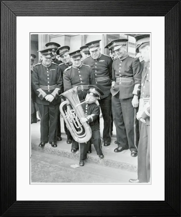 Framed Print : Boy Playing a Brass Instrument Framed Print : Boy Playing a Brass Instrument