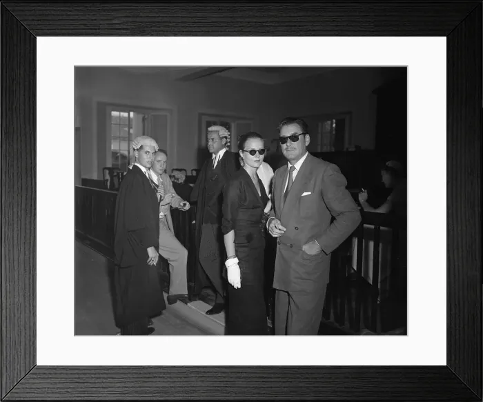 Framed Print : Errol Flynn with Wife in Court Framed Print : Errol Flynn with Wife in Court