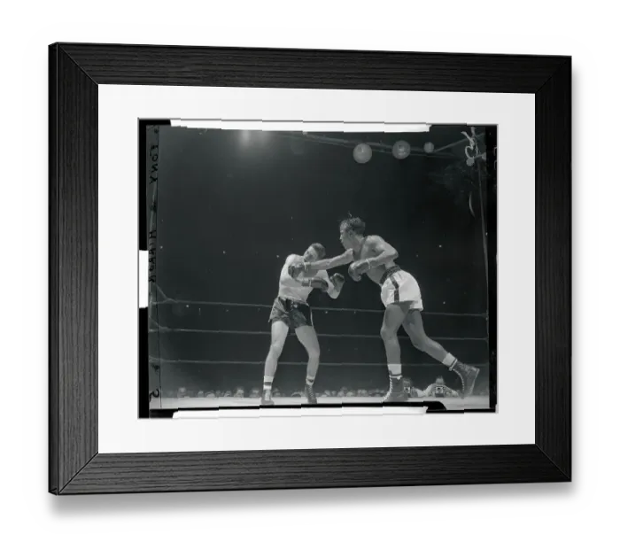 Framed Print : Johnny Bratton Punching Rocky Castellani Framed Print : Johnny Bratton Punching Rocky Castellani