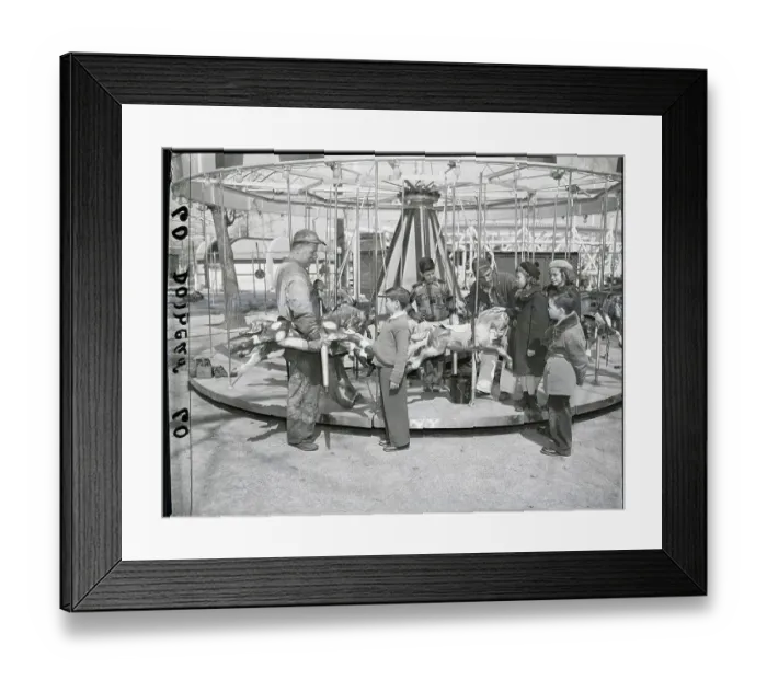 Framed Print : Children Watch Man Fix Merry Go Round Framed Print : Children Watch Man Fix Merry Go Round