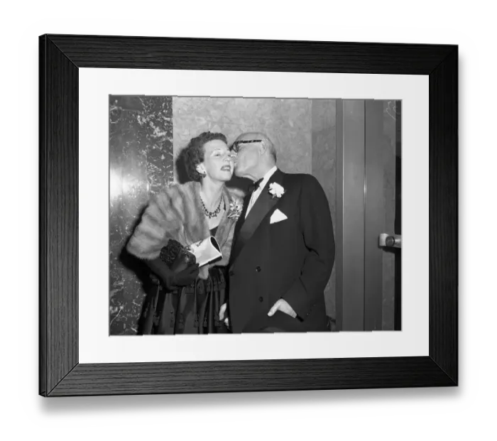 Framed Print : Sol Hurok Kissing Agnes de Mille