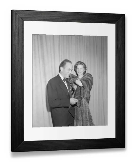 Framed Print : Humphrey Bogart and Lauren Bacall Arriving at Oscars