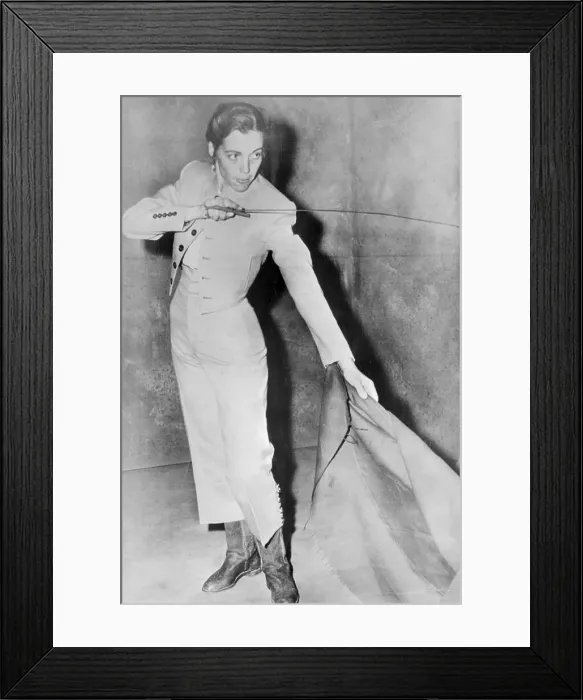 Framed Print : Female Matador Poses In Costume Framed Print : Female Matador Poses In Costume