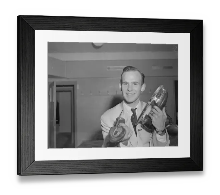 Framed Print : Figure Skater Dick Button Holding Skates Framed Print : Figure Skater Dick Button Holding Skates
