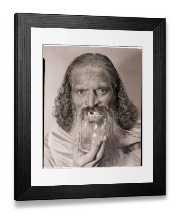 Framed Print : Bearded Man Eating Glass Framed Print : Bearded Man Eating Glass